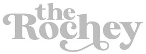 Logo of 'the Rochey' in gray on a white background